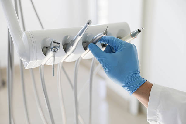 Professional Tooth Extraction technician working in San Marcos, TX